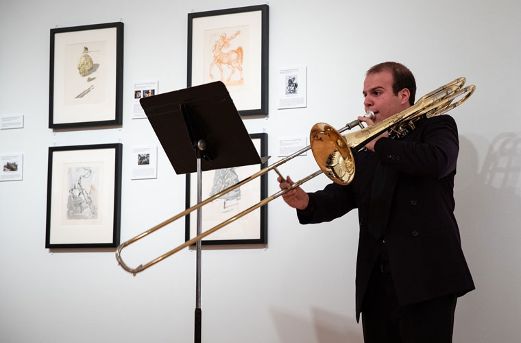 Students perform their original compositions in art gallery on the University of Louisiana campus